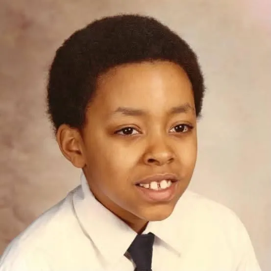 Kaleem Caire as a boy in a school portrait